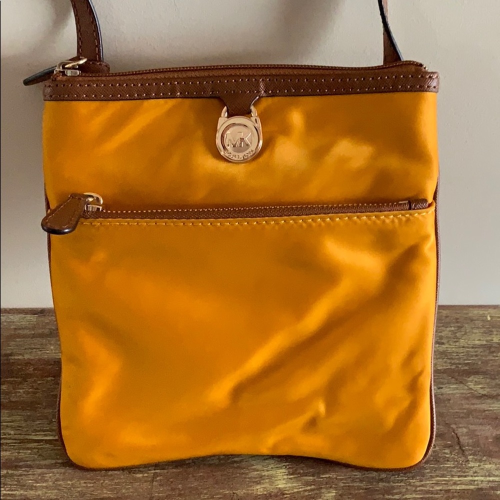 Gold Michael Kor’s crossbody